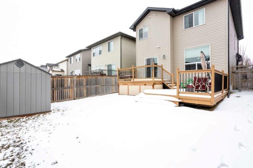 147 Morningside Mews Sw, Airdrie, AB - Outdoor With Deck Patio Veranda With Exterior