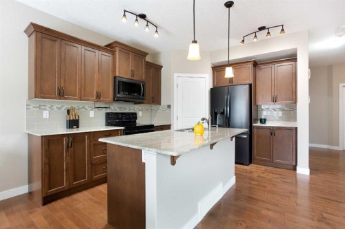 147 Morningside Mews Sw, Airdrie, AB - Indoor Photo Showing Kitchen