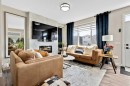 3675 Cornerstone Boulevard Ne, Calgary, AB  - Indoor Photo Showing Living Room With Fireplace 