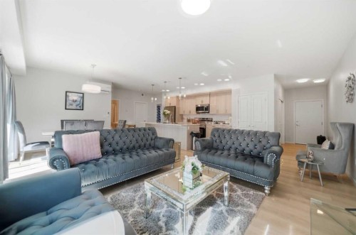 6105-20295 Seton Way Se, Calgary, AB - Indoor Photo Showing Living Room