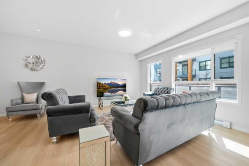 6105-20295 Seton Way Se, Calgary, AB - Indoor Photo Showing Living Room