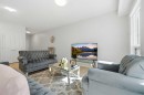 6105-20295 Seton Way Se, Calgary, AB  - Indoor Photo Showing Living Room 