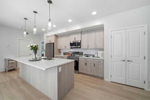 6105-20295 Seton Way Se, Calgary, AB - Indoor Photo Showing Kitchen With Upgraded Kitchen