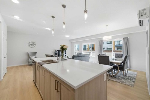 6105-20295 Seton Way Se, Calgary, AB - Indoor Photo Showing Kitchen With Double Sink