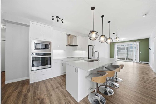 114-300 Auburn Meadows Common Se, Calgary, AB - Indoor Photo Showing Kitchen With Stainless Steel Kitchen With Double Sink With Upgraded Kitchen