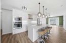114-300 Auburn Meadows Common Se, Calgary, AB  - Indoor Photo Showing Kitchen With Stainless Steel Kitchen With Double Sink With Upgraded Kitchen 