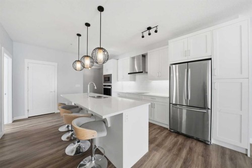 114-300 Auburn Meadows Common Se, Calgary, AB - Indoor Photo Showing Kitchen With Stainless Steel Kitchen With Double Sink With Upgraded Kitchen