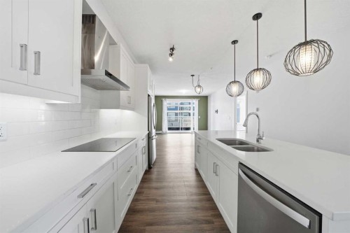 114-300 Auburn Meadows Common Se, Calgary, AB - Indoor Photo Showing Kitchen With Double Sink With Upgraded Kitchen