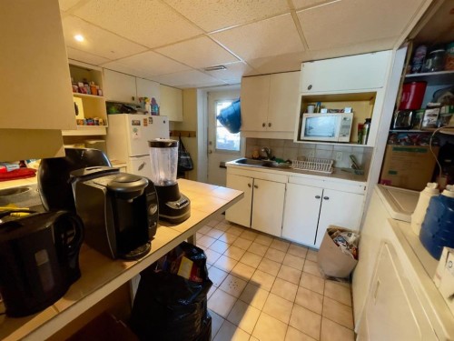 3311 Radcliffe Drive Se, Calgary, AB - Indoor Photo Showing Kitchen With Double Sink
