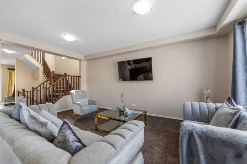 1148 Windhaven Close Sw, Airdrie, AB - Indoor Photo Showing Living Room