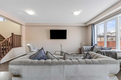 1148 Windhaven Close Sw, Airdrie, AB - Indoor Photo Showing Living Room