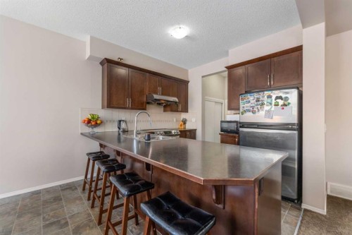 1148 Windhaven Close Sw, Airdrie, AB - Indoor Photo Showing Kitchen