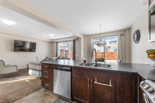 1148 Windhaven Close Sw, Airdrie, AB - Indoor Photo Showing Kitchen With Double Sink