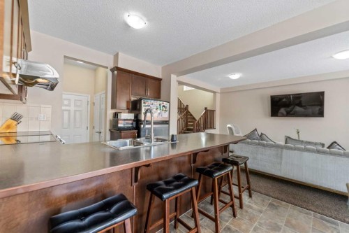 1148 Windhaven Close Sw, Airdrie, AB - Indoor Photo Showing Kitchen With Double Sink