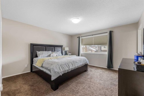 1148 Windhaven Close Sw, Airdrie, AB - Indoor Photo Showing Bedroom