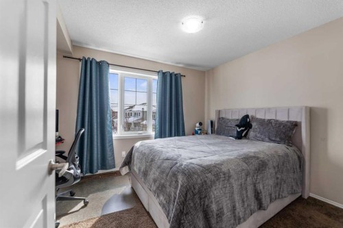 1148 Windhaven Close Sw, Airdrie, AB - Indoor Photo Showing Bedroom