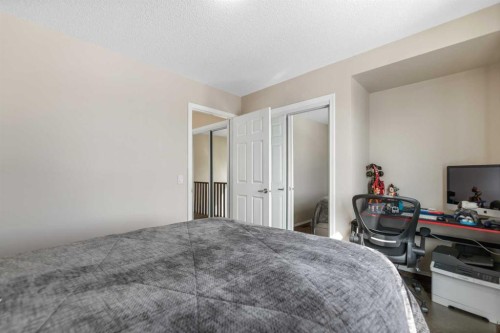 1148 Windhaven Close Sw, Airdrie, AB - Indoor Photo Showing Bedroom