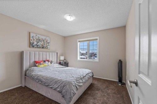1148 Windhaven Close Sw, Airdrie, AB - Indoor Photo Showing Bedroom