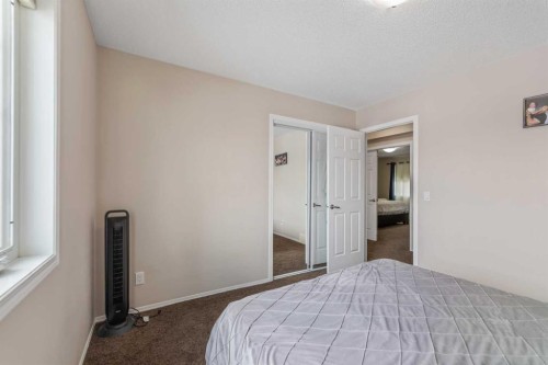 1148 Windhaven Close Sw, Airdrie, AB - Indoor Photo Showing Bedroom