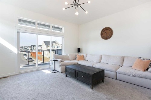 152 Cranbrook Gardens Se, Calgary, AB - Indoor Photo Showing Living Room
