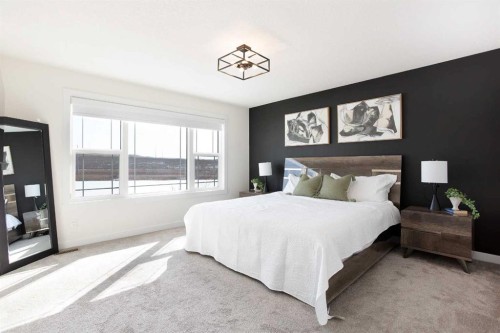 152 Cranbrook Gardens Se, Calgary, AB - Indoor Photo Showing Bedroom