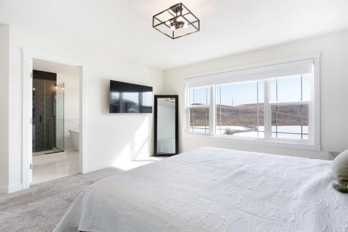 152 Cranbrook Gardens Se, Calgary, AB - Indoor Photo Showing Bedroom