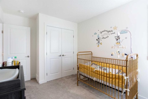 152 Cranbrook Gardens Se, Calgary, AB - Indoor Photo Showing Bedroom