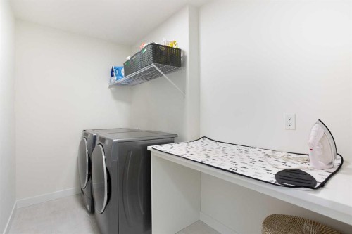 152 Cranbrook Gardens Se, Calgary, AB - Indoor Photo Showing Laundry Room