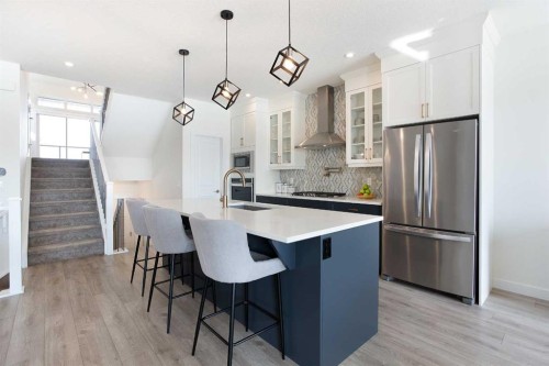 152 Cranbrook Gardens Se, Calgary, AB - Indoor Photo Showing Kitchen With Upgraded Kitchen