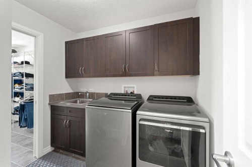 44 Cimarron Springs Circle, Okotoks, AB - Indoor Photo Showing Laundry Room