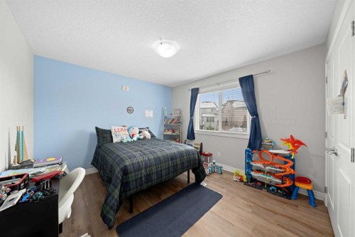 44 Cimarron Springs Circle, Okotoks, AB - Indoor Photo Showing Bedroom