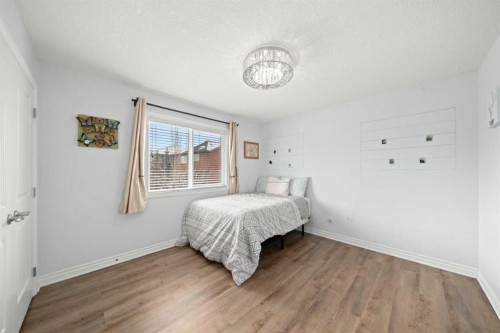 44 Cimarron Springs Circle, Okotoks, AB - Indoor Photo Showing Bedroom