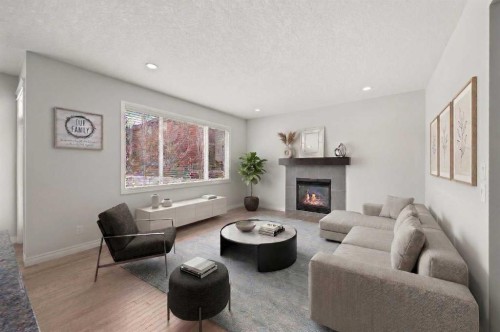 44 Cimarron Springs Circle, Okotoks, AB - Indoor Photo Showing Living Room With Fireplace