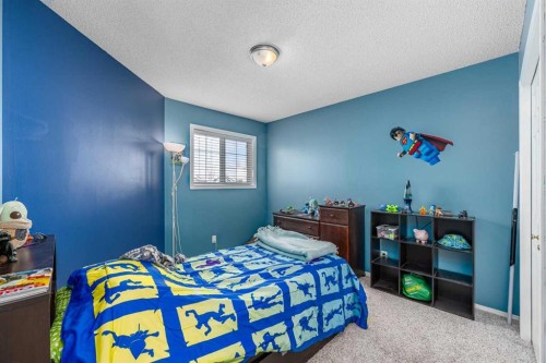 217 Bayside Place Sw, Airdrie, AB - Indoor Photo Showing Bedroom