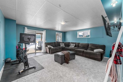 217 Bayside Place Sw, Airdrie, AB - Indoor Photo Showing Gym Room