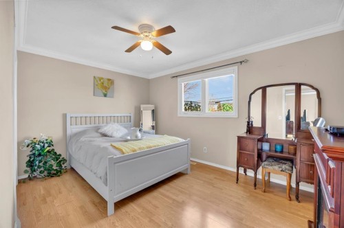 36 Alpine Crescent Se, Airdrie, AB - Indoor Photo Showing Bedroom