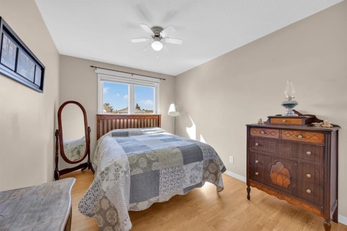 36 Alpine Crescent Se, Airdrie, AB - Indoor Photo Showing Bedroom