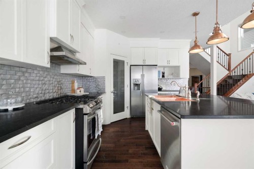 44 Cougar Ridge Green, Calgary, AB - Indoor Photo Showing Kitchen With Upgraded Kitchen