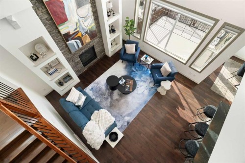 44 Cougar Ridge Green, Calgary, AB - Indoor Photo Showing Other Room With Fireplace