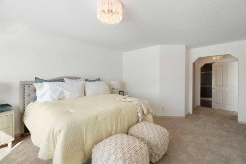 44 Cougar Ridge Green, Calgary, AB - Indoor Photo Showing Bedroom