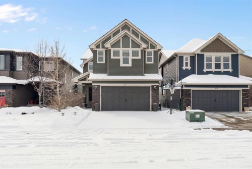 44 Cougar Ridge Green, Calgary, AB - Outdoor With Facade