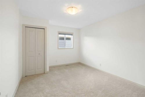 44 Cougar Ridge Green, Calgary, AB - Indoor Photo Showing Other Room