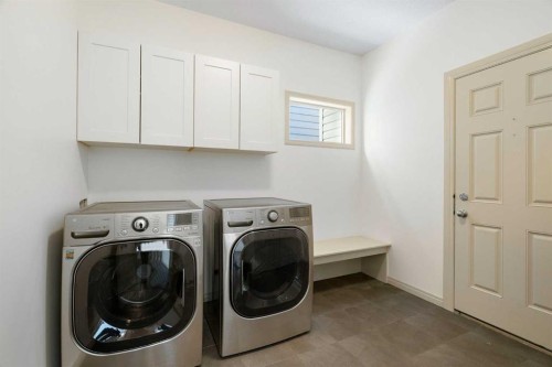 44 Cougar Ridge Green, Calgary, AB - Indoor Photo Showing Laundry Room