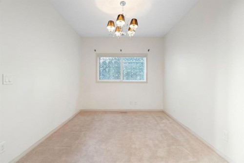 44 Cougar Ridge Green, Calgary, AB - Indoor Photo Showing Other Room