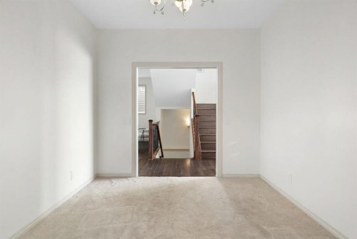 44 Cougar Ridge Green, Calgary, AB - Indoor Photo Showing Other Room