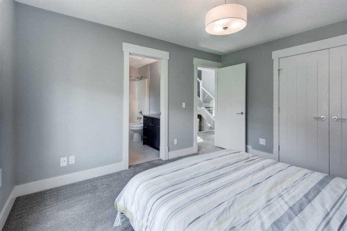 112 Burma Star Road Sw, Calgary, AB - Indoor Photo Showing Bedroom