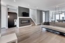 112 Burma Star Road Sw, Calgary, AB  - Indoor Photo Showing Living Room With Fireplace 