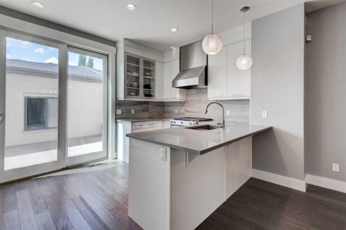 112 Burma Star Road Sw, Calgary, AB - Indoor Photo Showing Kitchen With Upgraded Kitchen