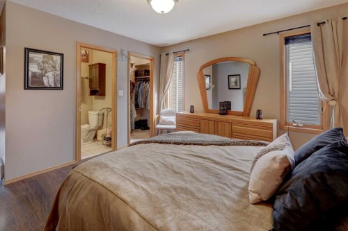 19 Everglade Drive Se, Airdrie, AB - Indoor Photo Showing Bedroom