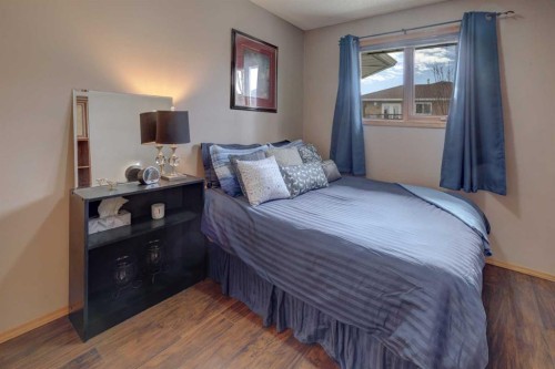 19 Everglade Drive Se, Airdrie, AB - Indoor Photo Showing Bedroom